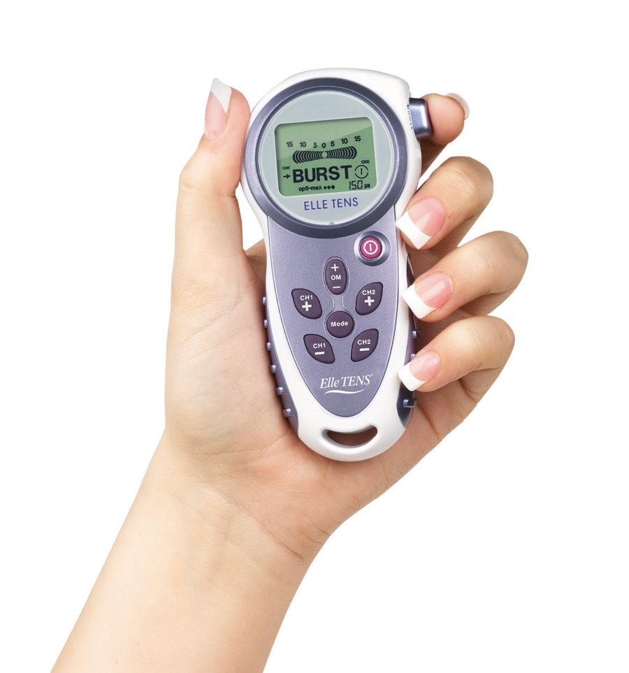 Elle TENS machine held in one hand